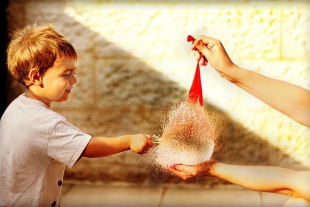 Playing with water is a great and refreshing option for those hot summer days. You can tackle the heat by having fun running around and throwing water balloons.
