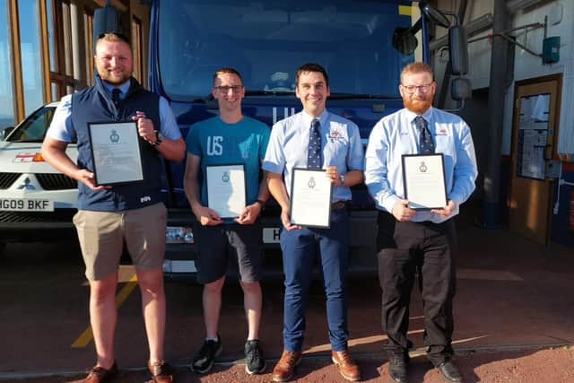Four members of Morecambe RNLI lifeboat crew have been awarded with commendations for saving the life of a girl trapped in quicksand. Picture from Morecambe RNLI.