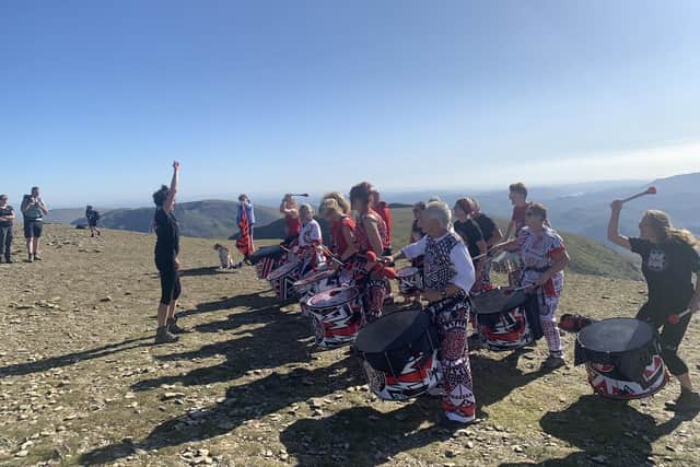 Batala Lancaster playing at the top of Helvellyn for the band’s 15th birthday celebrations in 2019.