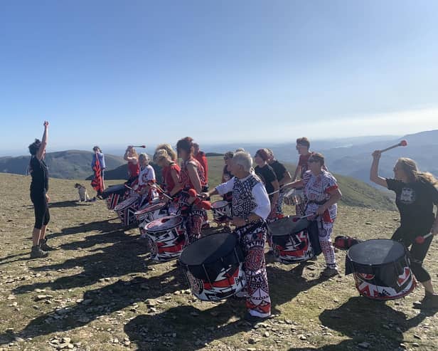 Batala Lancaster playing at the top of Helvellyn for the band’s 15th birthday celebrations in 2019.