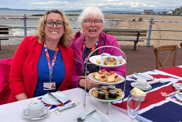 CancerCare director of fundraising Emma Athersmith and counsellor Fiona MacDonald. As one of the event's chosen charities, CancerCare received 50 per cent of the table sales (£2,500).
