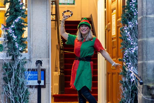Deputy head of fundraising Kat Michaels gets ready for the festive season at CancerCare.