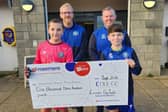 The Lancaster City youth tournament cheque presentation to Rosemere - Alan and Darren at the back with Oliver and Tommy holding the cheque.