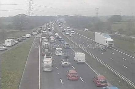 Two lanes are closed with miles of queuing traffic due to a vehicle fire on the M6 Northbound from J33 (A6, Lancaster South / Garstang) to J34 (Bay Gateway, Lancaster).