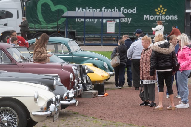 People look at the classic cars at the start of the Distinguished Gentleman's Drive in Morecambe at the weekend.