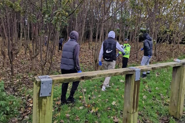 Young people from Blackpool and Sixth Form College conducting a knife sweep. Picture from Lancashire Police.
