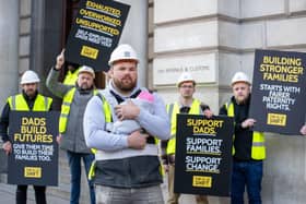Self-employed dads with The Dad Shift outside HM Revenue & Customs.