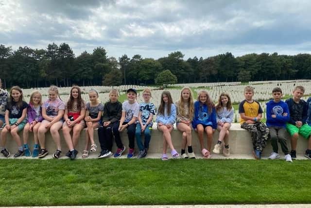 Paying their respects at Etaples WW1 Military cemetery.