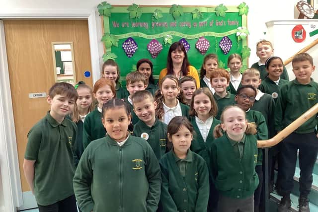 Headteacher of Scotforth St Paul's CE Primary & Nursery School, Katie Walsh, with some of the pupils.