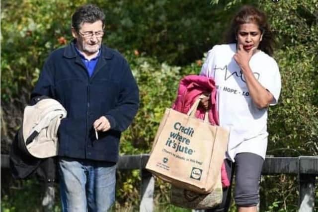 CARRONSHORE. Carronshore Road. The Shore. Douglas Traynor and Shanti Traynor who were running The Shore were evicted on Tuesday, October 3. The couple are pictured walking away from Carron towards Falkirk. Picture Michael Gillen.