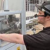 Made Smarter says Lancashire manufacturers must over come barriers to going digital. Here a machine operator at JTAPE tests out handsfree smart glasses