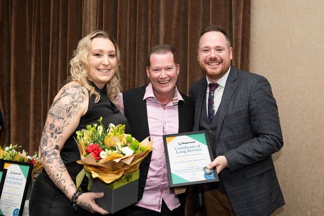Stagecoach Long Service Awards - award recipient Lyndon Orriss, (centre) with his wife, Keely Orriss, presented with his long service award by managing director Tom Waterhouse (right). PHOTOGRAPHY: HARRY ATKINSON