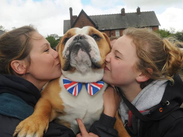 Jo Muller and Paige Bell with dog Winston during the visit of the Queen to Lancaster and Bilsborrow in 2015.