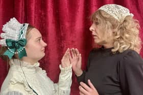 The play features Matilda Walden as the younger Jennet Device, while Helen Logan plays the older Jennet Device.