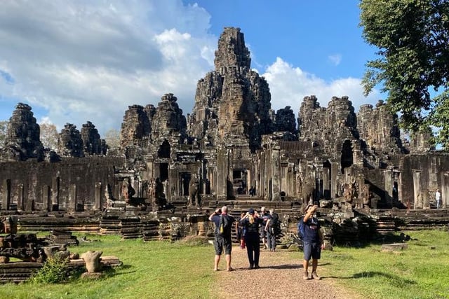 The trekkers arrive at the stunning Angkor Wat, the most famous ancient temple site in Cambodia.