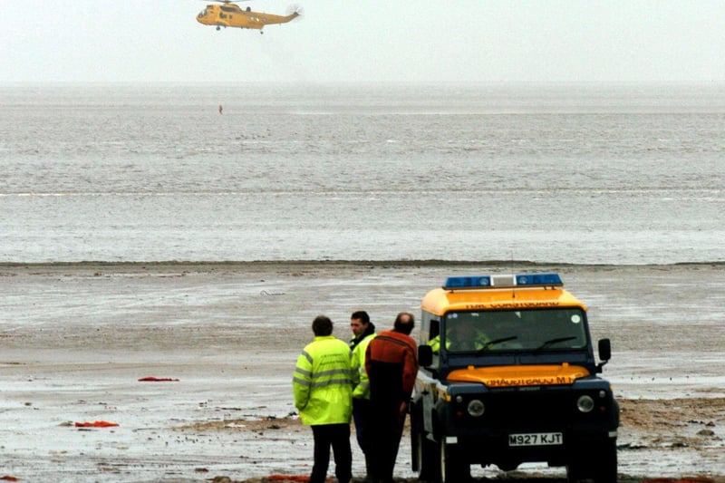 Rescue teams continue their search over Morecambe Bay on Friday February 6, 2004.