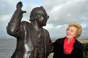 Eric Morecambe statue's return to Morecambe. Eric Morecambe's widow Joan poses with the statue. Picture by Julian Brown for The LEP 11/12/14.