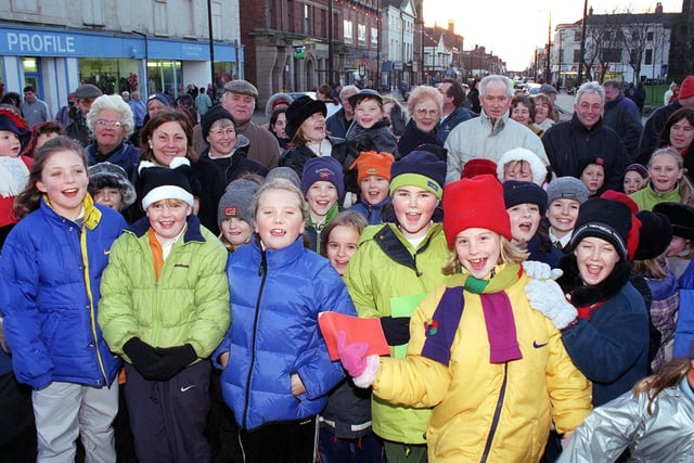 School children join in the carol singing, at the switch-on of Fleetwood's Christmas lights