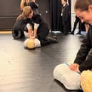 Pupils learning CPR at Bay Leadership Academy.