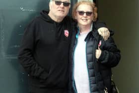 Morecambe kitman Les Dewhirst and wife Debbie before Saturday's win against Burton Albion