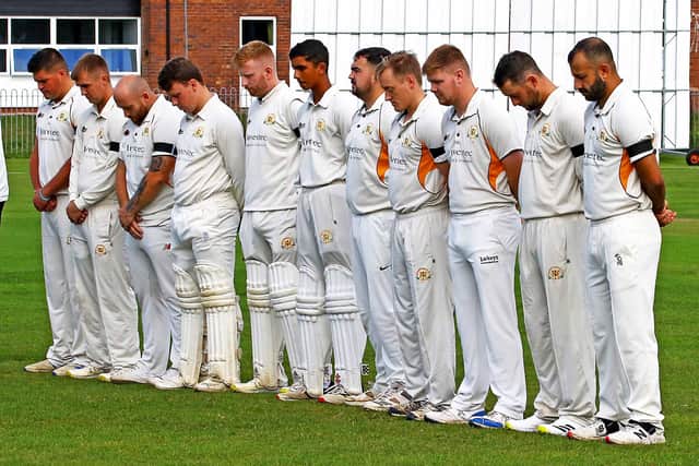 Morecambe CC's players pay their respect to Queen Elizabeth II Picture: Tony North