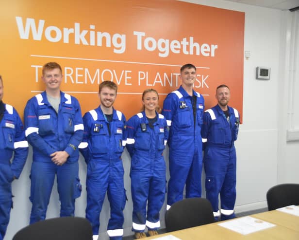 A group photo of the Heysham 1 power station apprentices who have graduated.