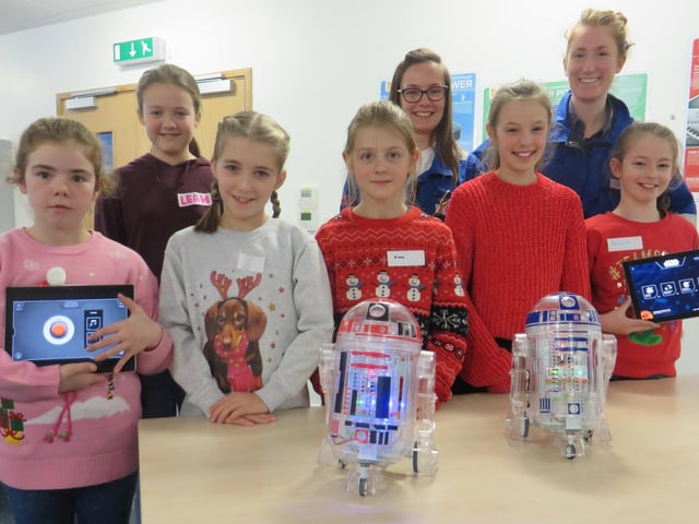Engineers at Heysham 2 Alex Wilcox and Ally Shankland with some of the girls who took part in an Engineering Day at Heysham Power Station.