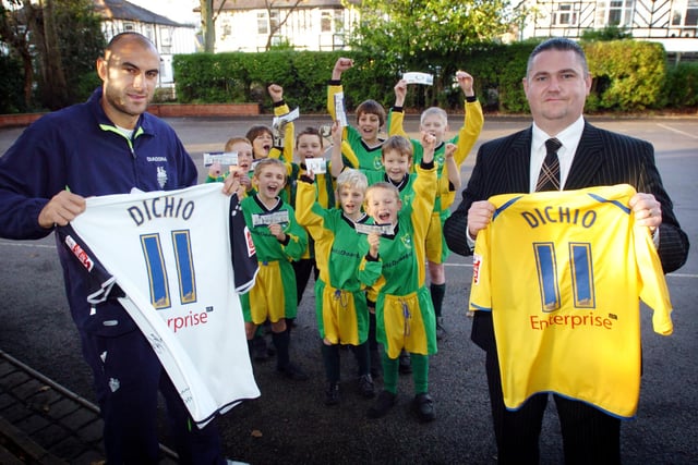 Preston North End striker Danny Dichio along with Andy Wallace from Consumer Credit Solutions hand over PNE match tickets and signed shirts to youngsters at Ribby with Wrea School