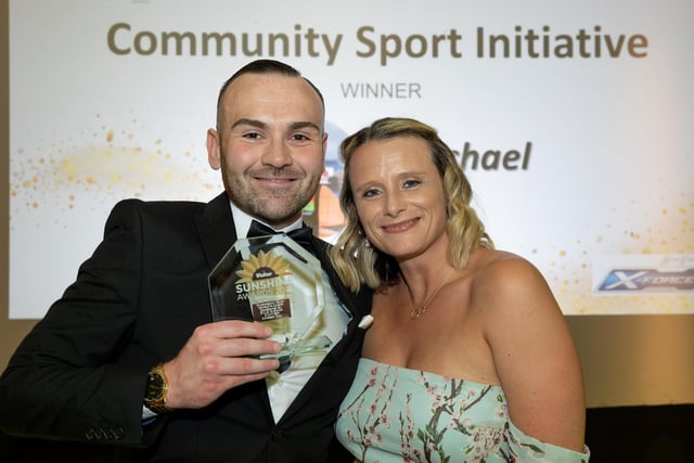 Sport Initiative winner Michael Roy receives his award from Deena Gillan, general manager at 3-1-5 X-Force.
