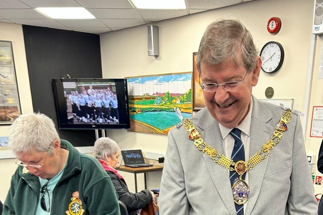 Mayor of Lancaster Councillor Roger Dennison chats with a veteran at the official opening of the new hub and drop-in centre in Morecambe.
