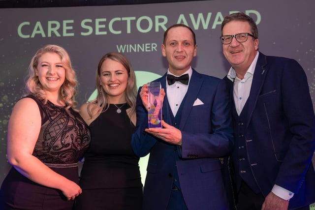 Care Sector Award winners Westmorland Homecare receive their award from Uniform & Leisurewear Company Managing Director, David Hoyle (right). Runners-up were Jayne Fleetwood of Bespoke Care Services and Lorna Stevens of Citizens Advice North Lancashire.
