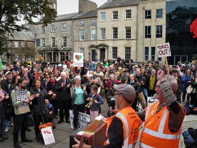 Protesters gather in Dalton Square as part of the Enough is Enough day of action.