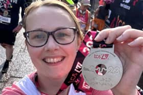 Cat Smith MP with her London Marathon medal.