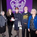 Winter Gardens Preservation Trust chair Prof Vanessa Toulmin and volunteers receive their King's Award from the Lord-Lieutenant of Lancashire, Amanda Parker JP.