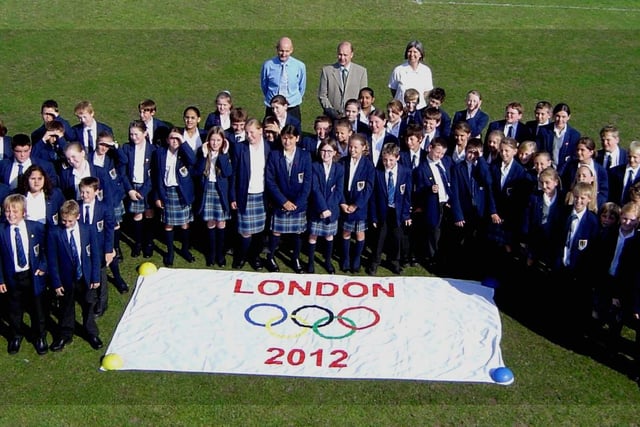 Some of the year 7 pupils who started at King Edward VII and Queen Mary School in Lytham attended a special ceremony to mark the presentation to their school of a London Olympics 2012 flag