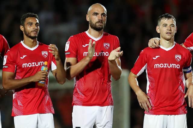 l-r: Max Melbourne, Farrend Rawson and Donald Love are three of the Morecambe players under contract Picture: Lewis Storey/Getty Images