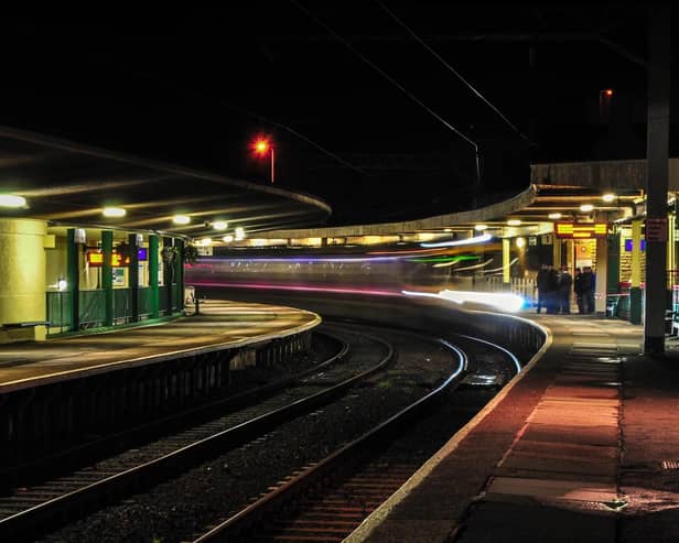 Night trail of a train entering Carnforth Station with the clock made famous in the 1940s film Brief Encounter in shot on the right. Thanks to Russ Holt from Prestwich, Manchester, for the picture.