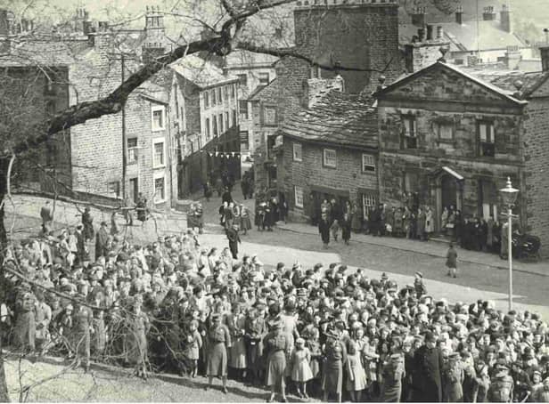 Crowds gathered outside Lancaster Castle, waiting for the Queen's visit in 1955. Photo courtesy of Lancaster City Museum.