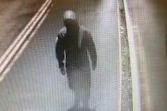 Police want to speak to this person captured on CCTV in connection with racist and homophobic graffiti being sprayed around Morecambe. Picture from Lancashire Police.