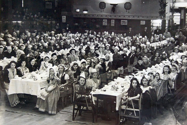 Hundreds of children assembled at the Central Pier for a party to celebrate the end of World War Two in 1945.