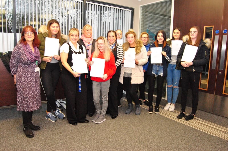 Lancaster and Morecambe College travel students and their tutor with their NCS certificates. 