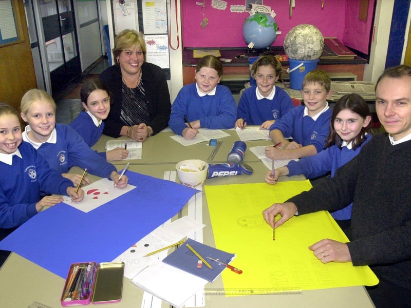 Headteacher Susan Fielden and deputy David Merritt with pupils at Torrisholme School.