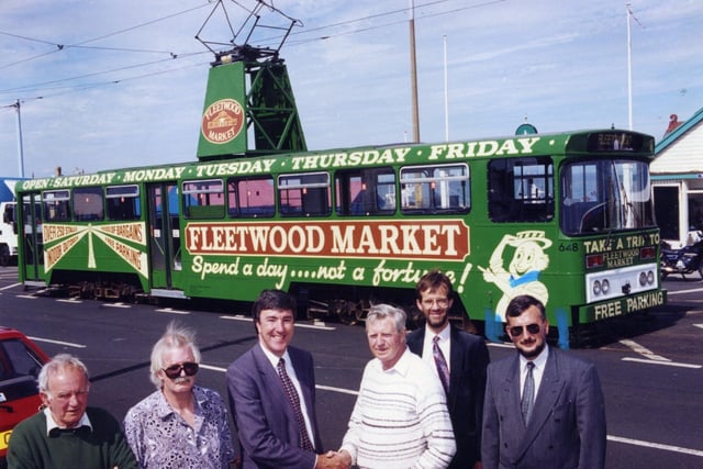 Fleetwood Market livery on a tram in the town. Pictured: (third from left) Blackpool Transport managing director Tony Depledge. On the far right is Wyre Council estates officer Keith Dewsbury