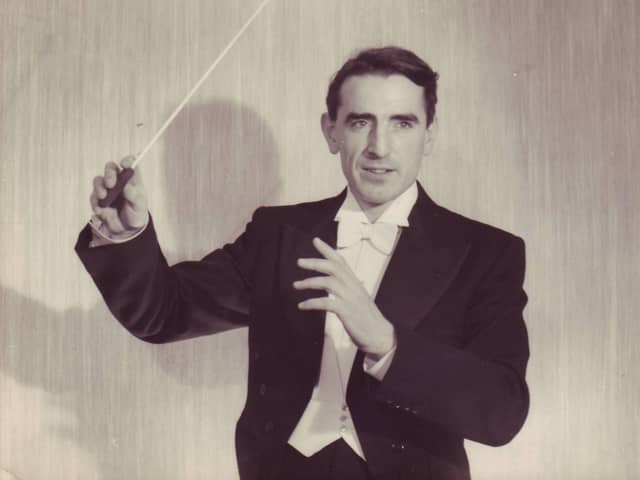 Ernest Tomlinson conducting many years ago.