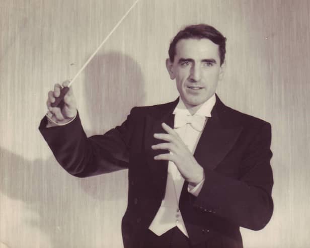 Ernest Tomlinson conducting many years ago.