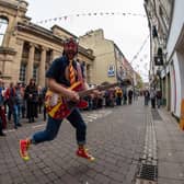 The Howling Clowns in New Street during Lancaster Music Festival's Shop-Front Juke Box performances. Photo by Angela Cobham.