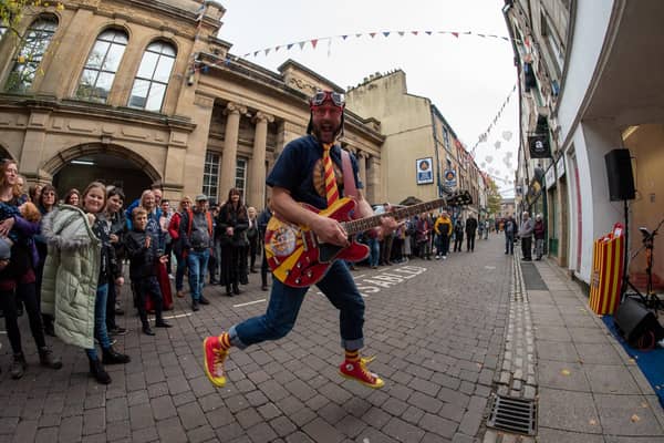 The Howling Clowns in New Street during Lancaster Music Festival's Shop-Front Juke Box performances. Photo by Angela Cobham.