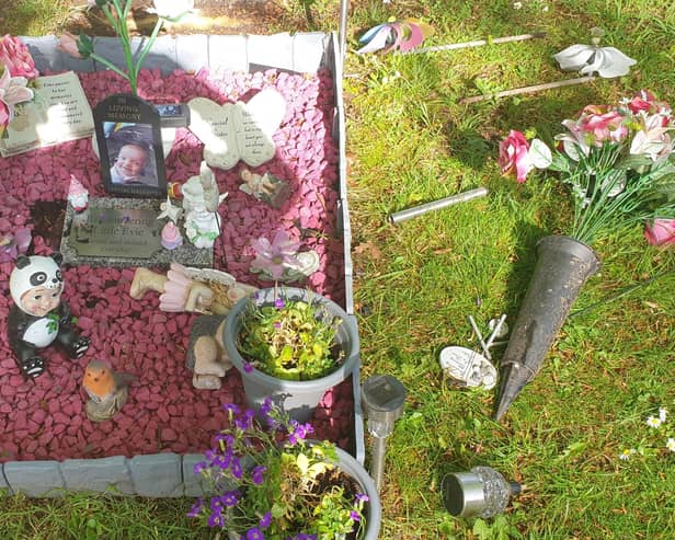 How Evie's grave looked after it was vandalised.