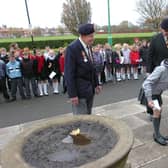 Children from Shakespeare Primary School in Fleetwood are first to try community project designed to raise awareness of Remembrance Day and create more respect for war memorials among young people. Head boy Michael Head and head girl Megan Gair lay a wreath at the base of the memorial in 2006