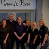 Matt Thiss, Hannah Thiss and Luke Thistlethwaite with staff outside Harry's Bar in Morecambe last year.